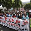 London delivery riders protest against acid attacks