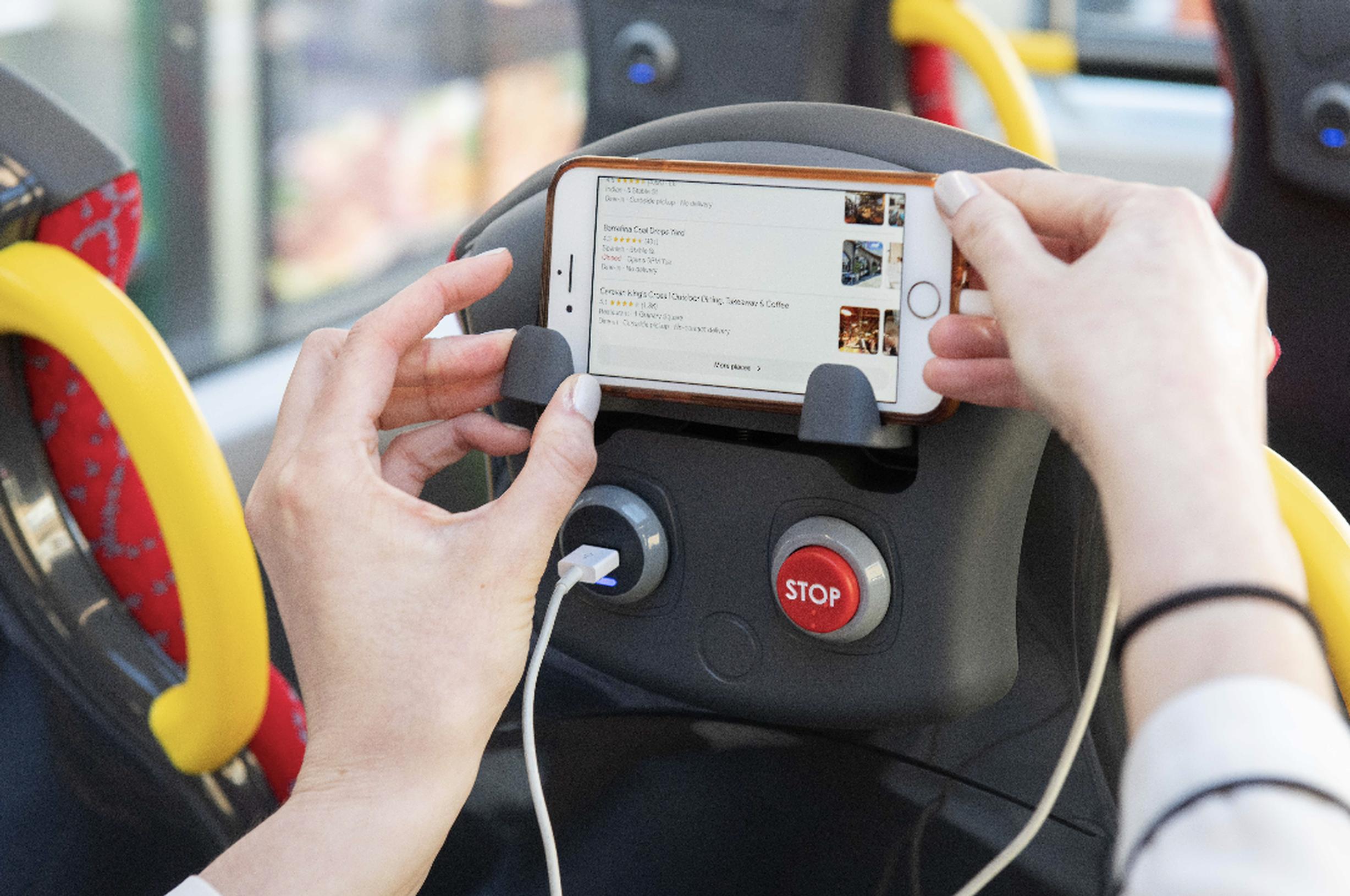 The new buses feature USB chargers and mobile phone holders in the seats