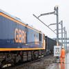 Trial uses moveable overhead cables for freight trains