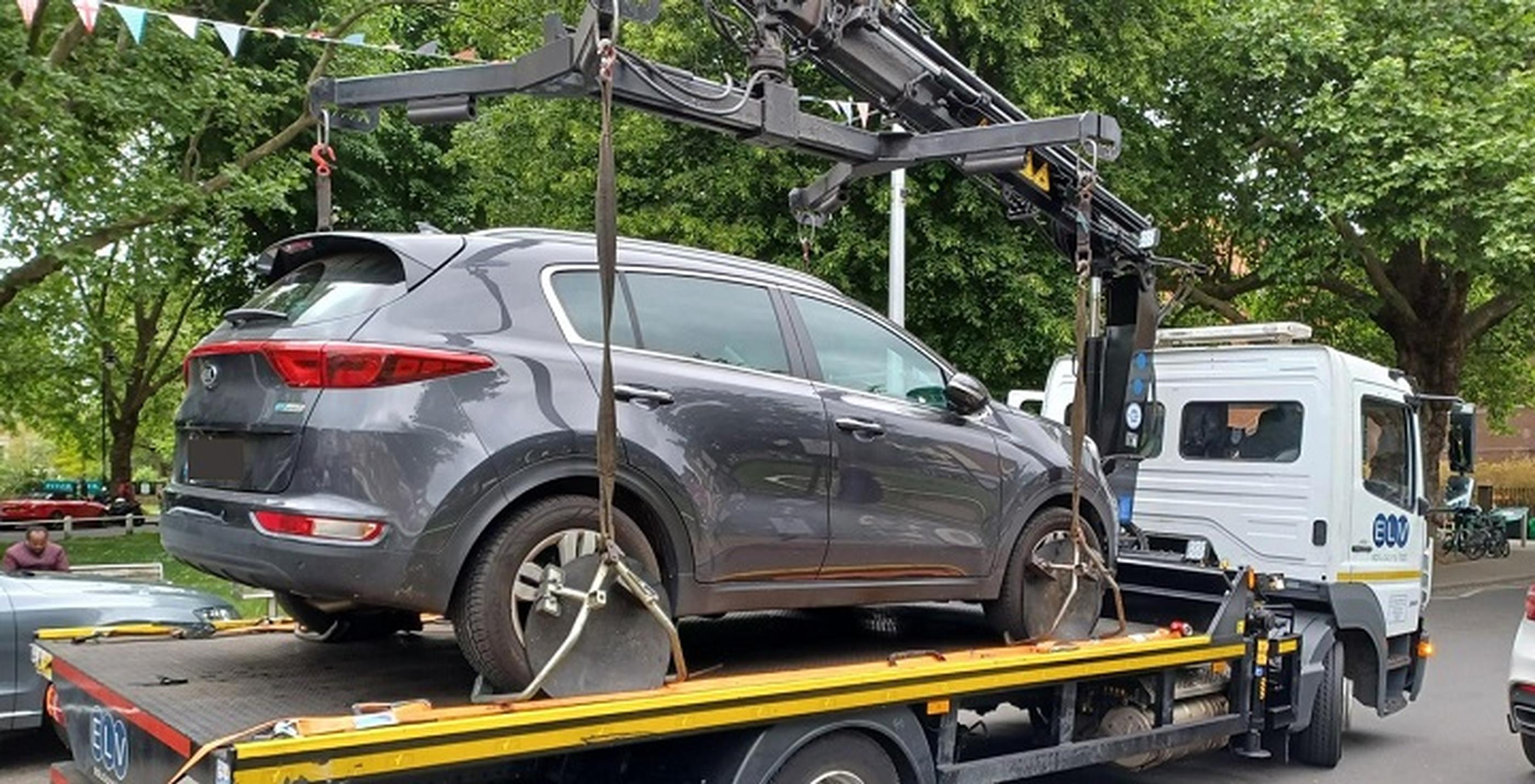 A vehicle is removed on the Blue Badge Day of Action