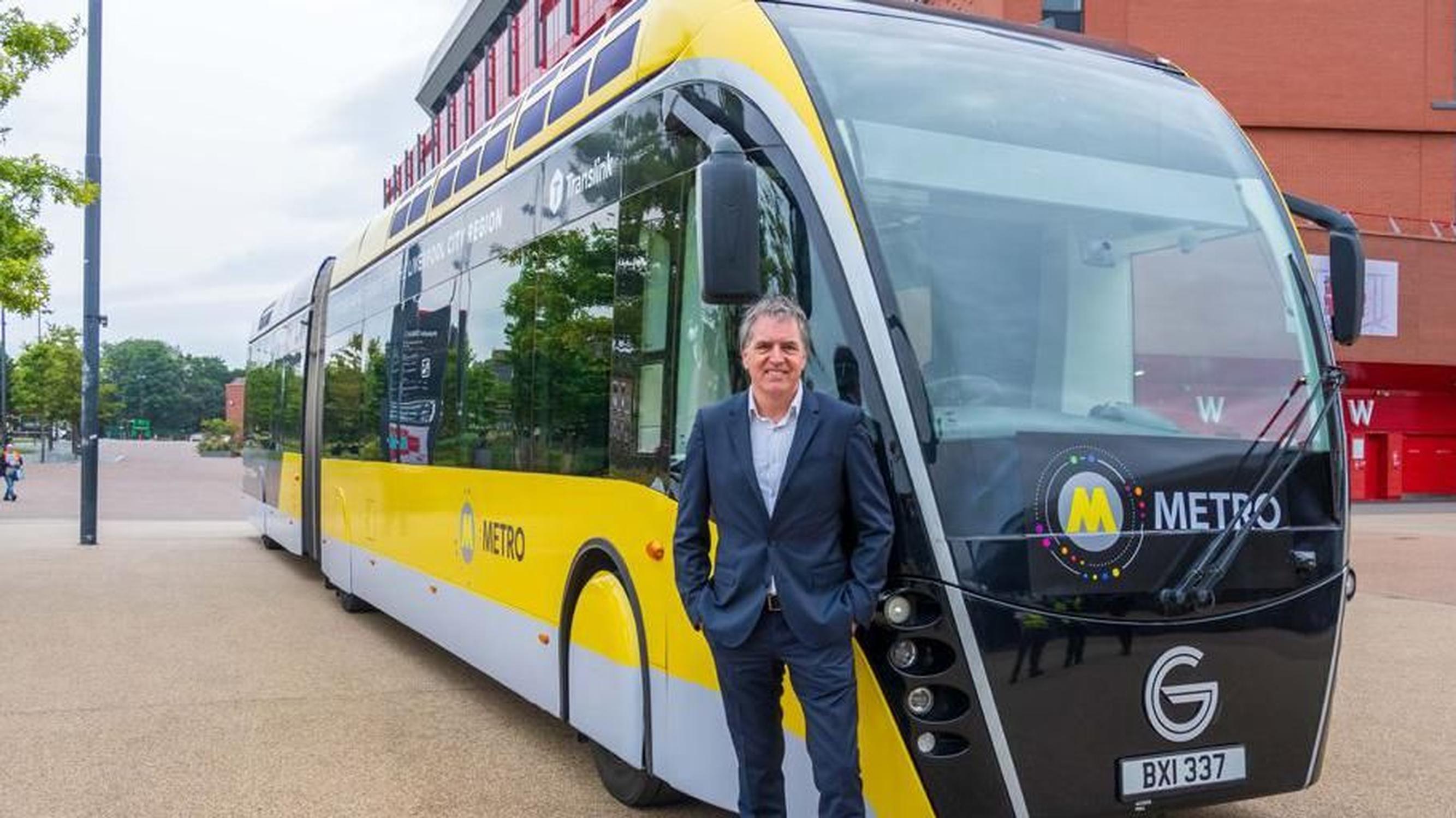 Liverpool Mayor Steve Rotheram with the Glider bus