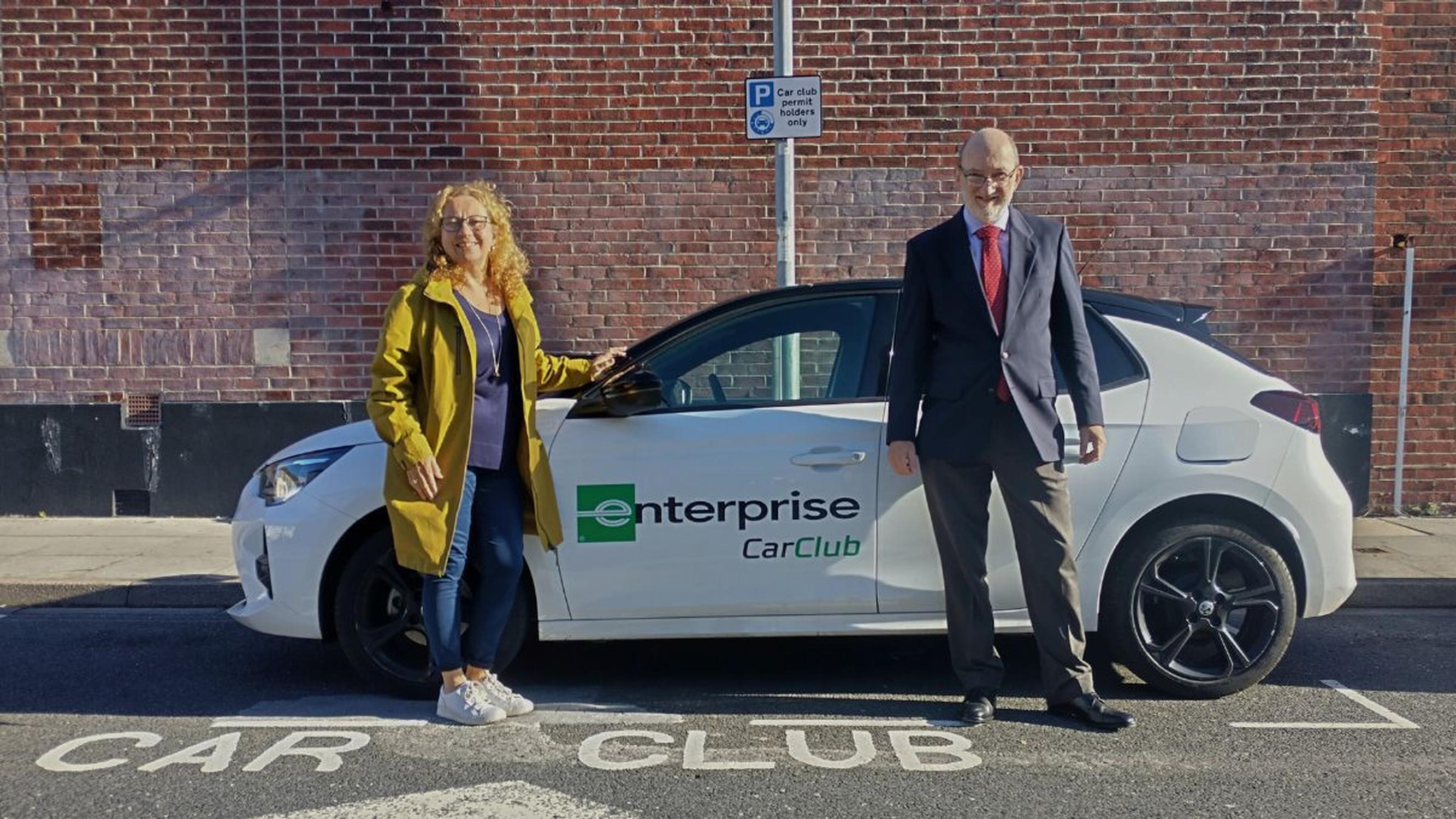 Cllr Suzy Horton (left) and Cllr Peter Candlish (right) with Enterprise Car Club vehicle in Southsea